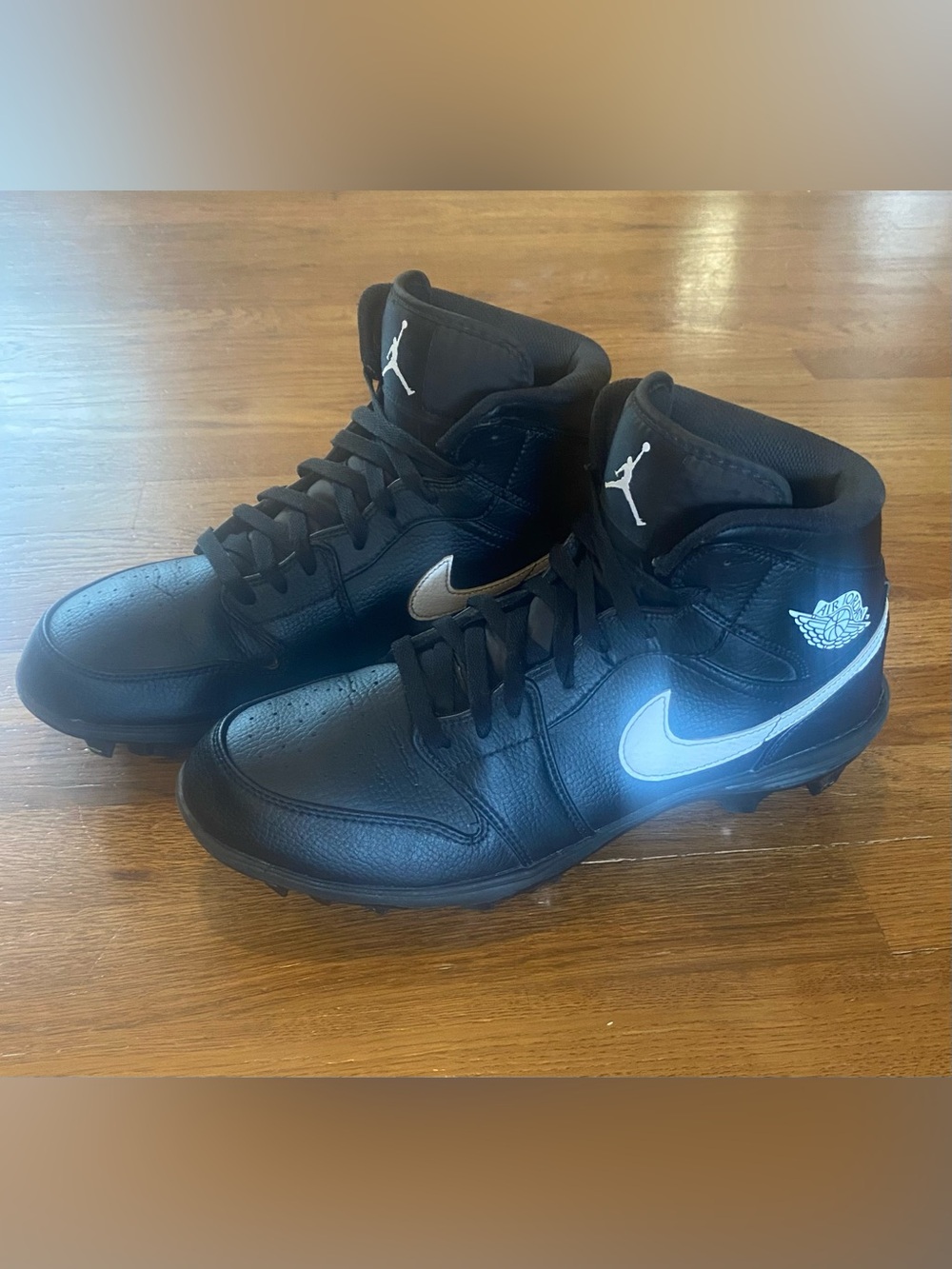 Nike Black High-Top Jordan Sneakers with White Swoosh Football cleats
